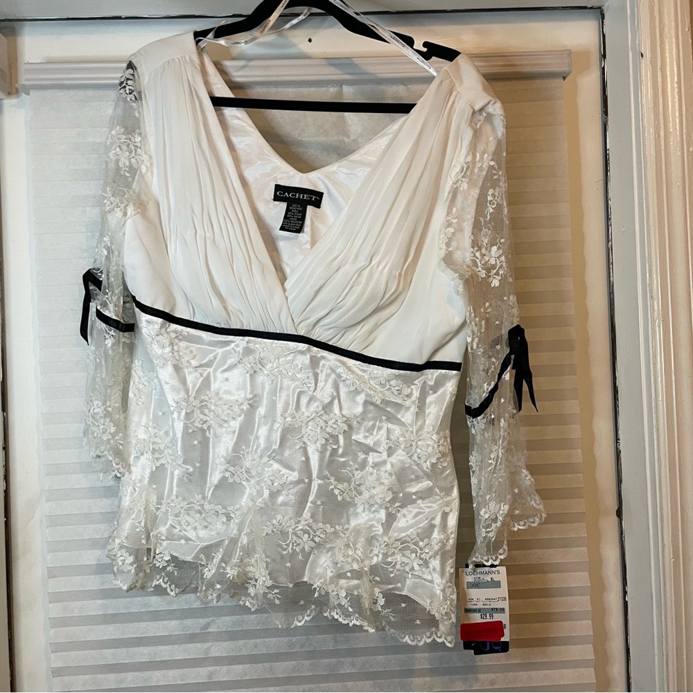 White lace top with black trim